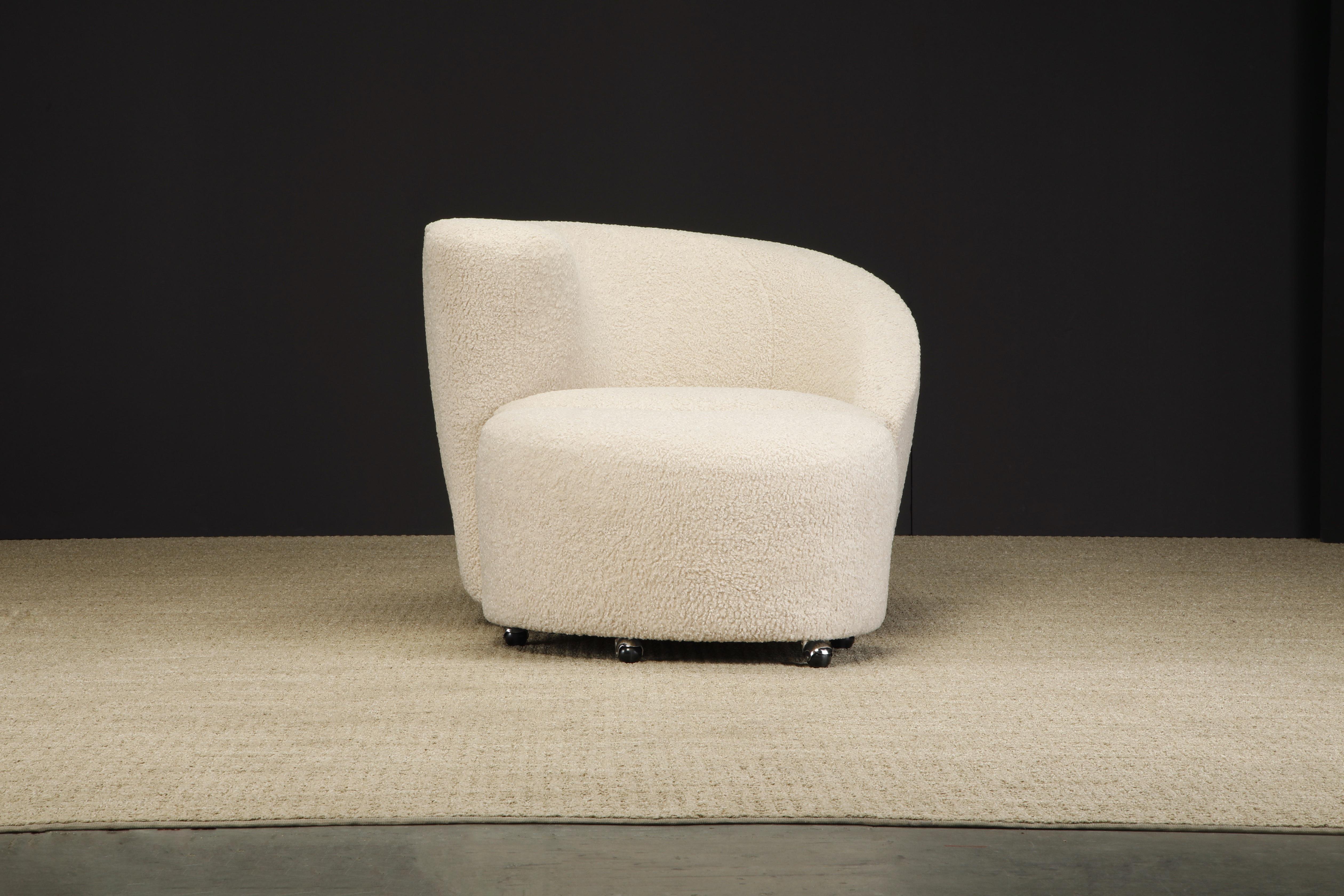 Newly reupholstered in a soft and nubby light beige bouclé, this 'Corkscrew' swivel chair with ottoman by Vladimir Kagan for Directional, circa 1980s / 90s is signed with a Directional label underneath the chair. This classic Post-Modern club chairs