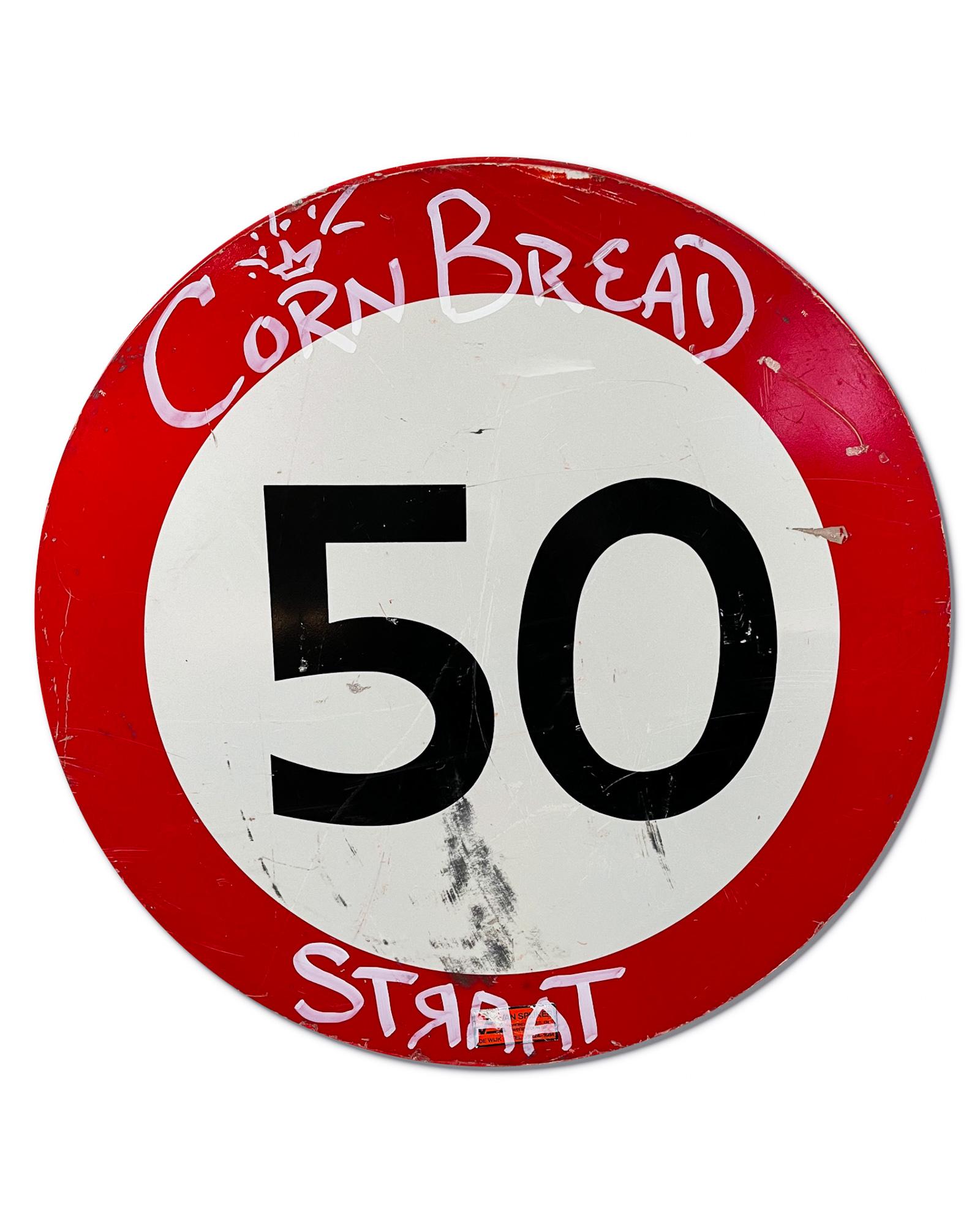 This artwork titled "Cornbread STRAAT Shield" is an original artwork by Cornbread made of acrylic paint on a retired Amsterdam street sign. The piece measures 80cm / 31.5in diameter. 

Darryl McCray, known by his tagging name, “Cornbread,” is a
