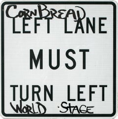 "Must Turn Left World Stage", Street Art, Graffiti, Found Sign, Cornbread