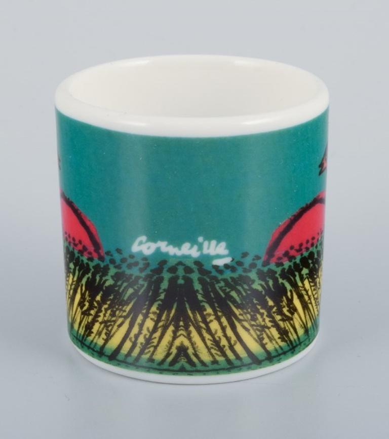 Late 20th Century Corneille. Coffee cup, plate and egg cup in porcelain decorated with birds. For Sale