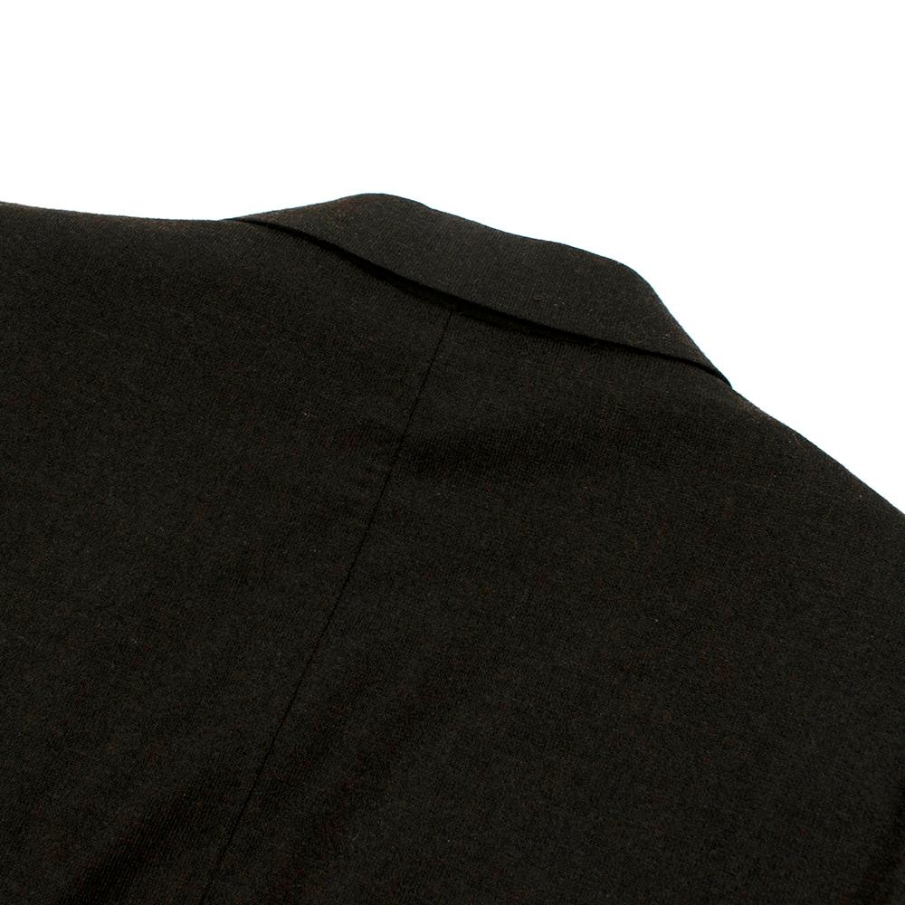 Corneliani Brown/Grey Wool & Cashmere Single Breasted Blazer

-Made of a soft wool and cashmere blend 
-Classic single breasted 
-Button fastening to the front 
-3 pockets to the front 
-Vents to the back 
-Buttoned cuffs 
-3 interior pockets