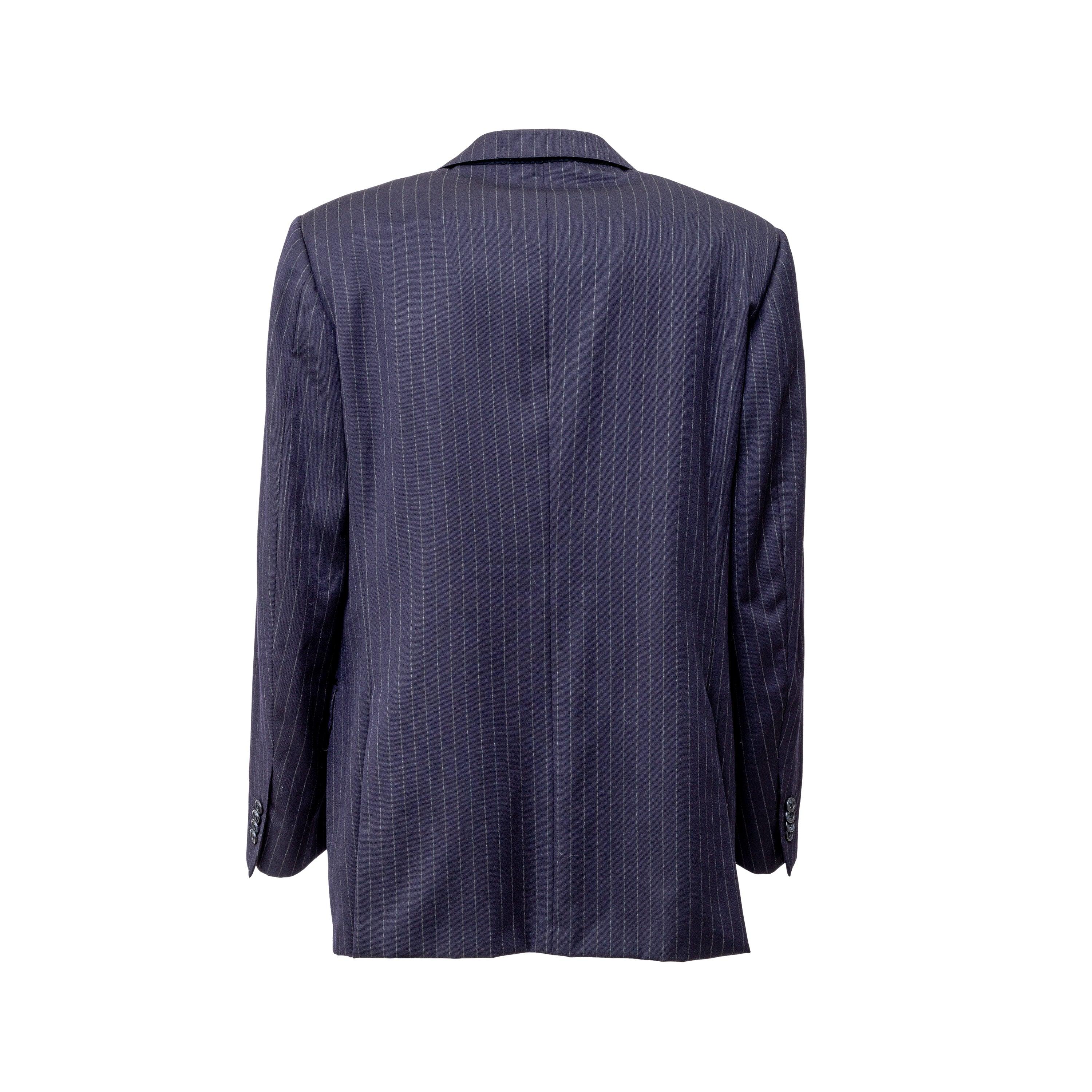 Expertly crafted from 100% virgin wool, the Corneliani Pinstripe Suit is a timeless addition to any wardrobe. With a dark blue pinstripe design and notched lapel collar, this suit exudes sophistication. Complete with three front buttons and tailored
