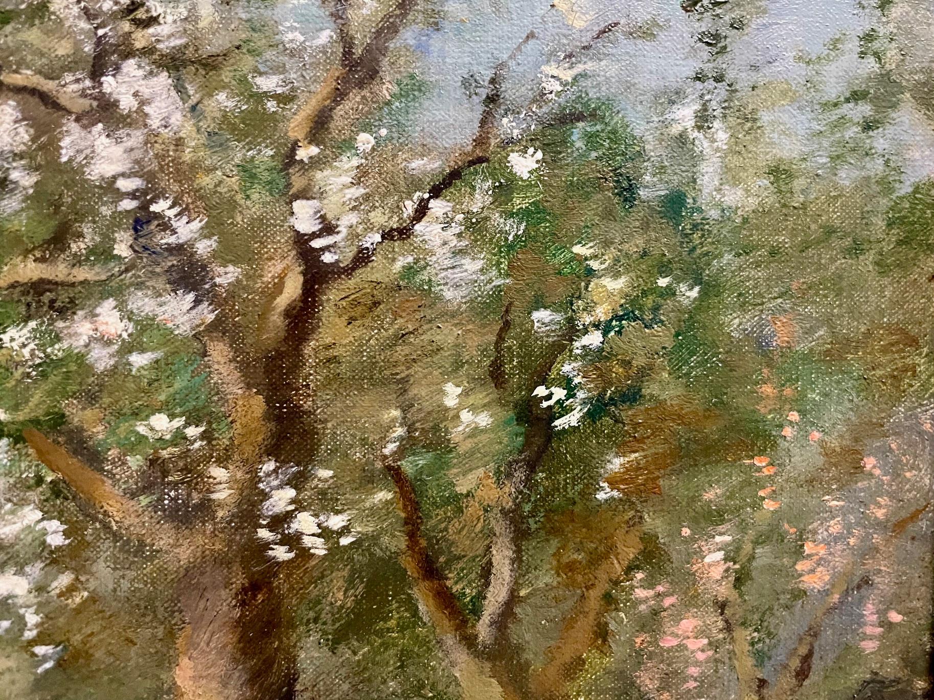 Springtime, 'In the Meadow' de Cornelis Bouter (1888-1966) est une peinture hollandaise avec des figures et un paysage dans un style impressionniste avec des fleurs du début du printemps. Scène idyllique au bord d'une rivière sous des arbres en