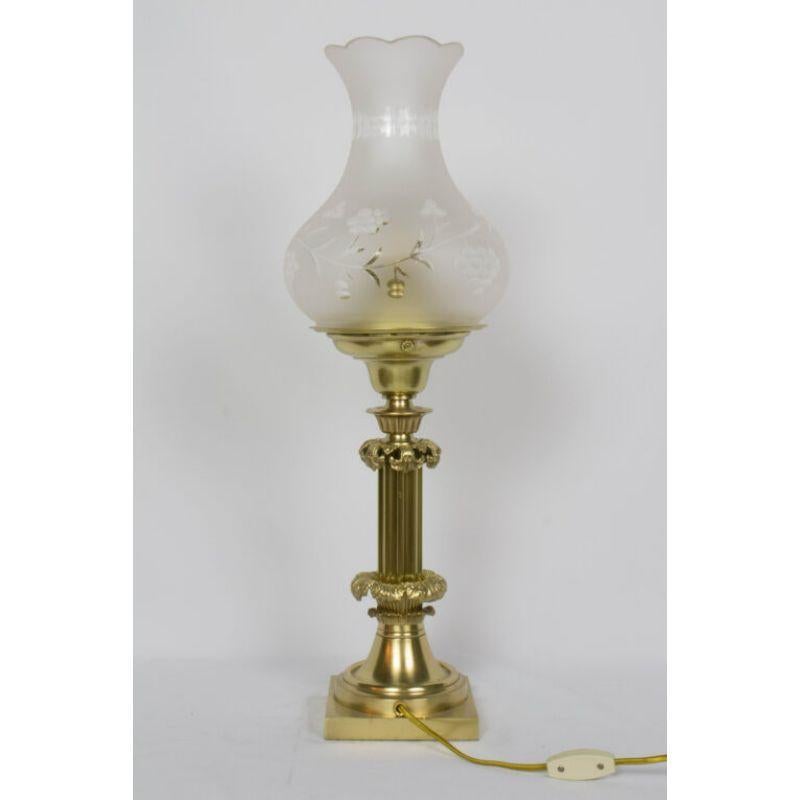 Cornelius & Company Astral lamp. A distinguished piece for a study or office. Brass Column form with finely cast acanthus leaves. Shade is mouth blown, frosted cut glass. C. 1850. Electrified, replacement glass.

Dimensions: 
Height: 26?
Width: