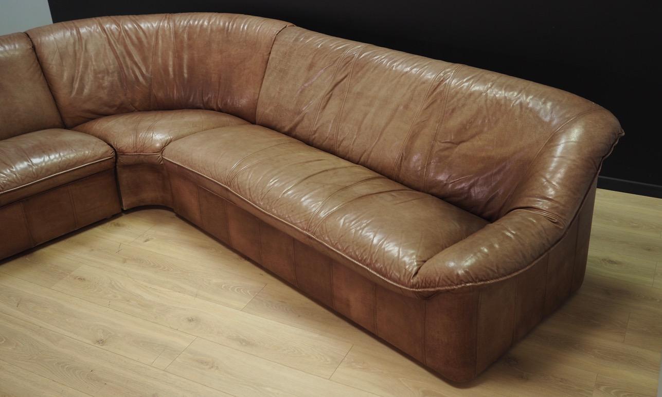 Fantastic corner sofa from the 1960s-1970s. Scandinavian design, Minimalist form. Upholstery made of natural leather in brown color. Maintained in good condition (visible signs of use), directly for use.

Dimensions:
Module 1 height 78 cm, width