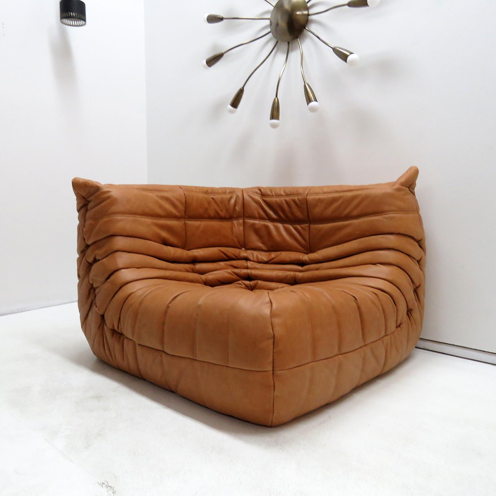 Stunning cognac colored aniline leather corner chair from the 