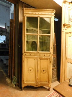 Corner display cabinet in yellow lacquered wood with glass part, Italy