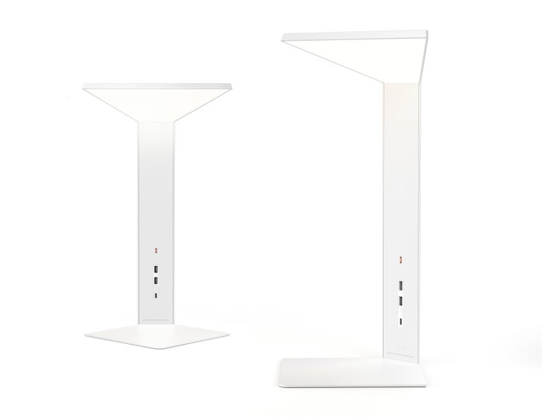 Corner office systemic and flexible, offering various degrees of privacy and power provision. The system comprises three elements: a glare-free, fully dimmable LED corner task light that incorporates power ports featured in its armature; a set of