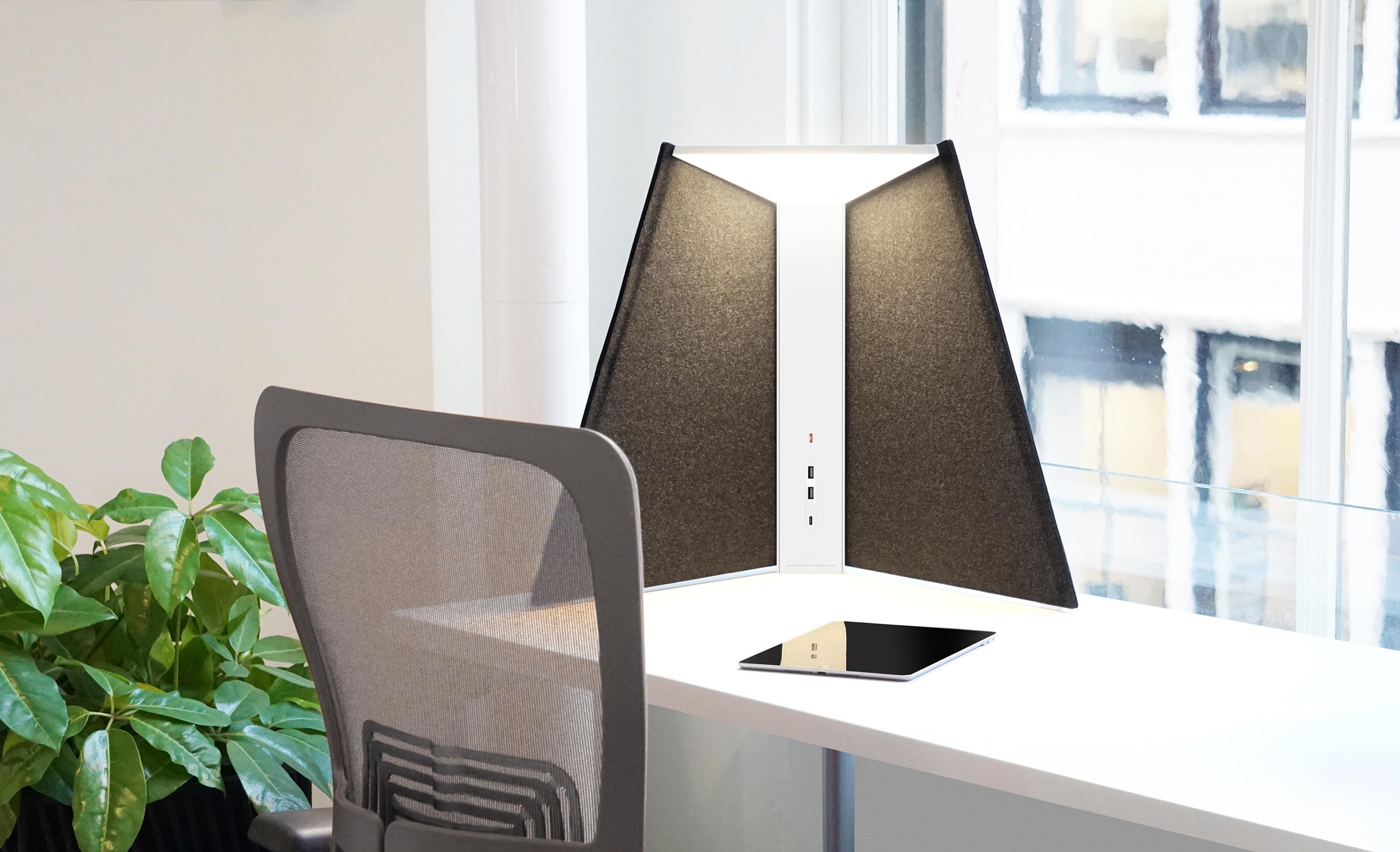 Corner office systemic and flexible, offering various degrees of privacy and power provision. The system comprises three elements: a glare-free, fully dimmable LED corner task light that incorporates power ports featured in its armature; a set of