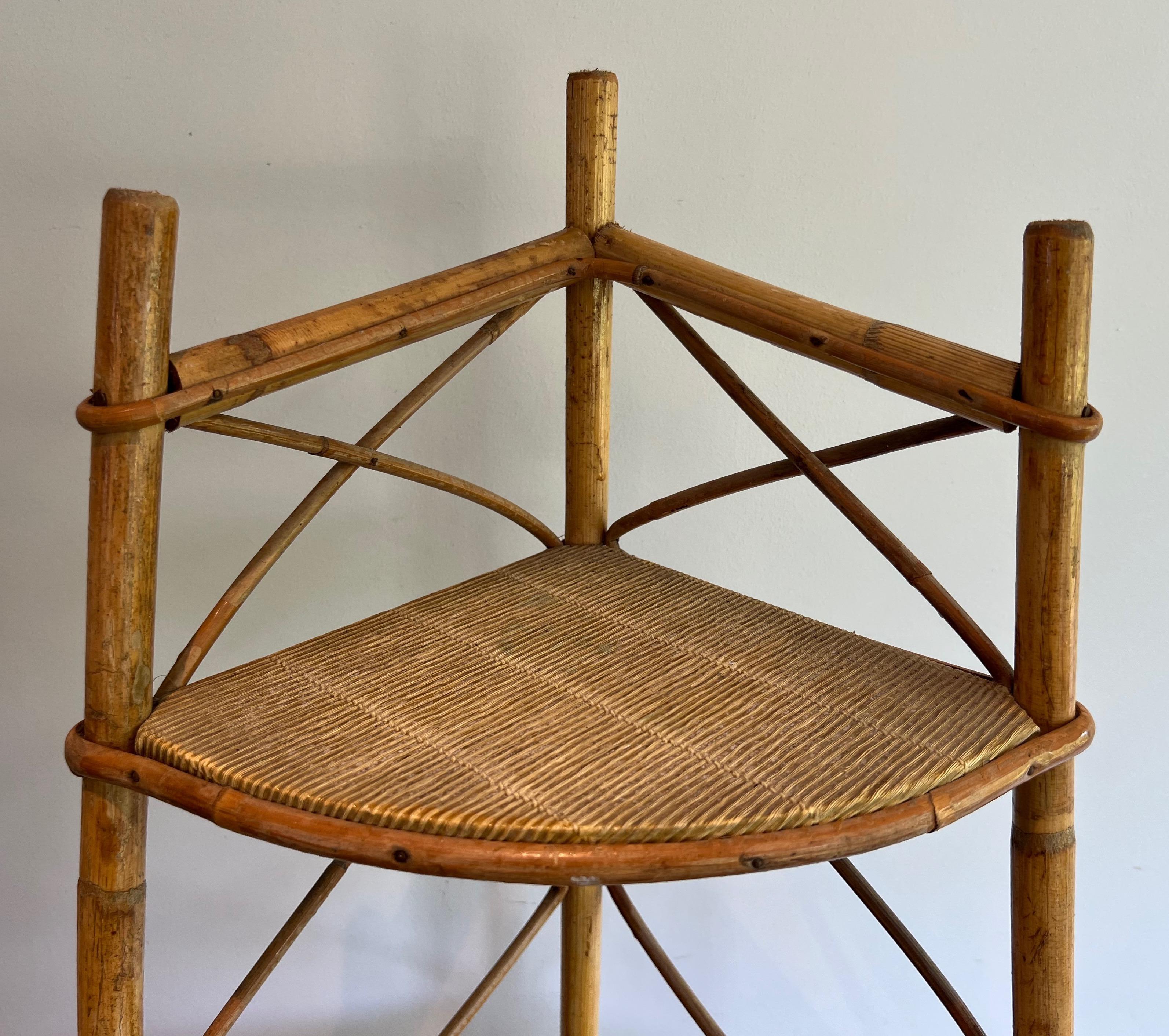 Mid-20th Century Corner Rattan Shelves Unit. French work by Adrien Audoux et Frida Minet. 1950's For Sale