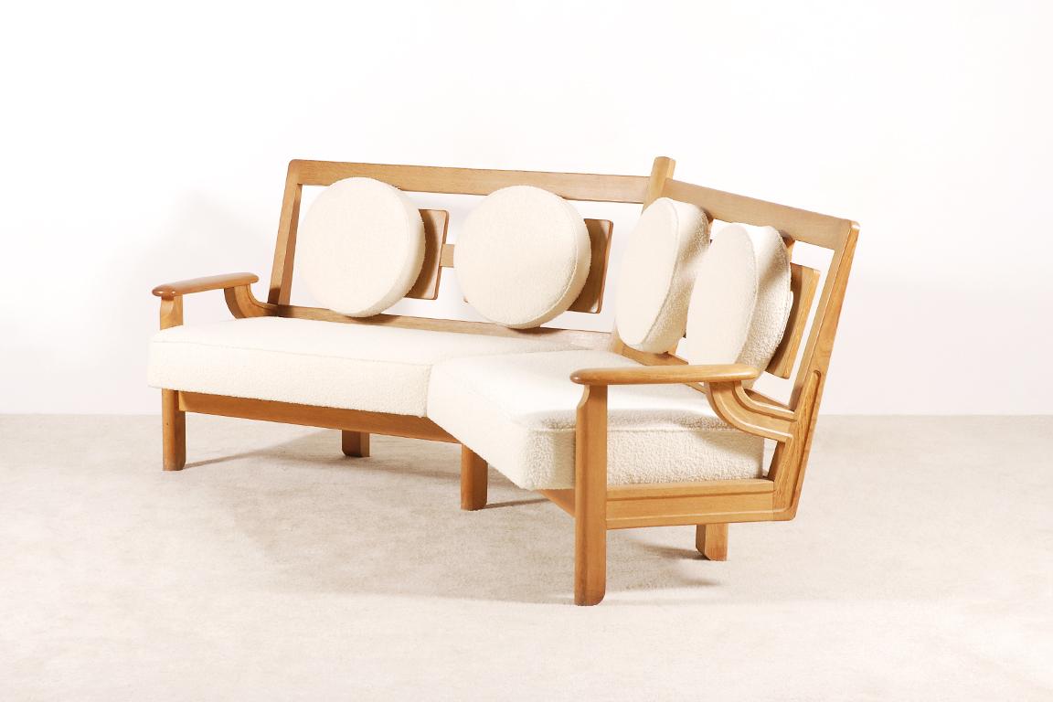 Here is a corner 4 seater sofa in natural oak, model 