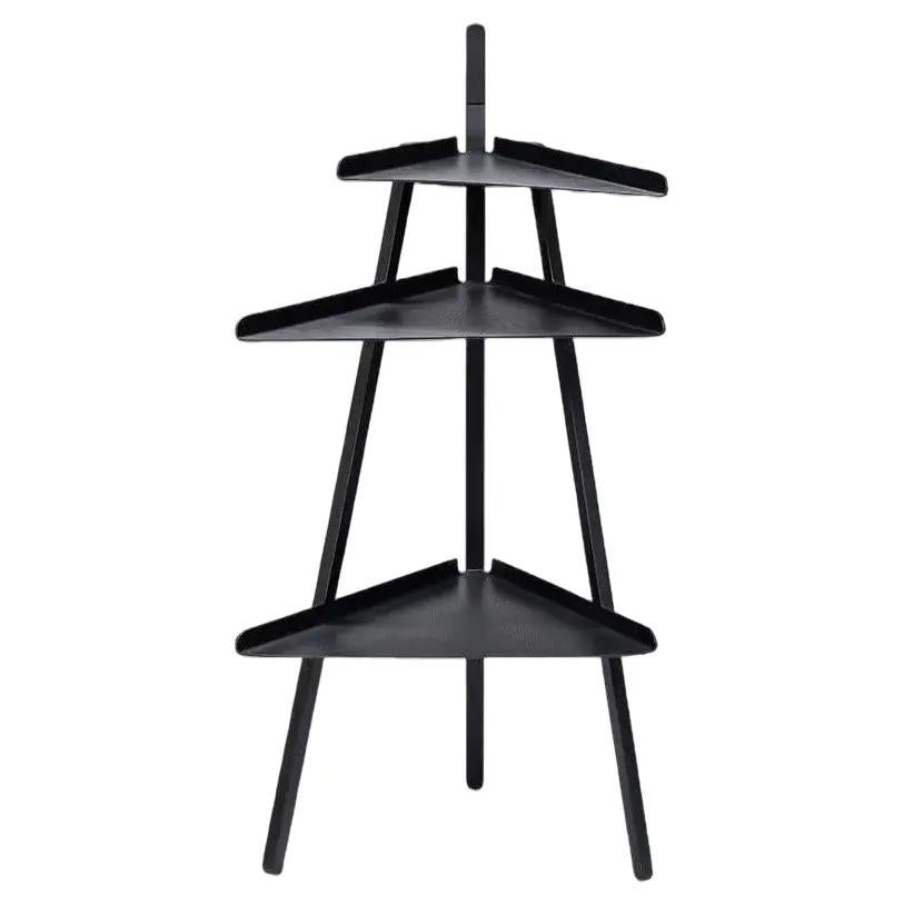 Interflex Trio – Corner Table
Design: Achille Castiglioni, 1988

Designed by Achille Castiglioni in 1988 for Interflex, the Trio table stems from the designer’s reflection on unused spaces—those often-overlooked corners of a home that, with good