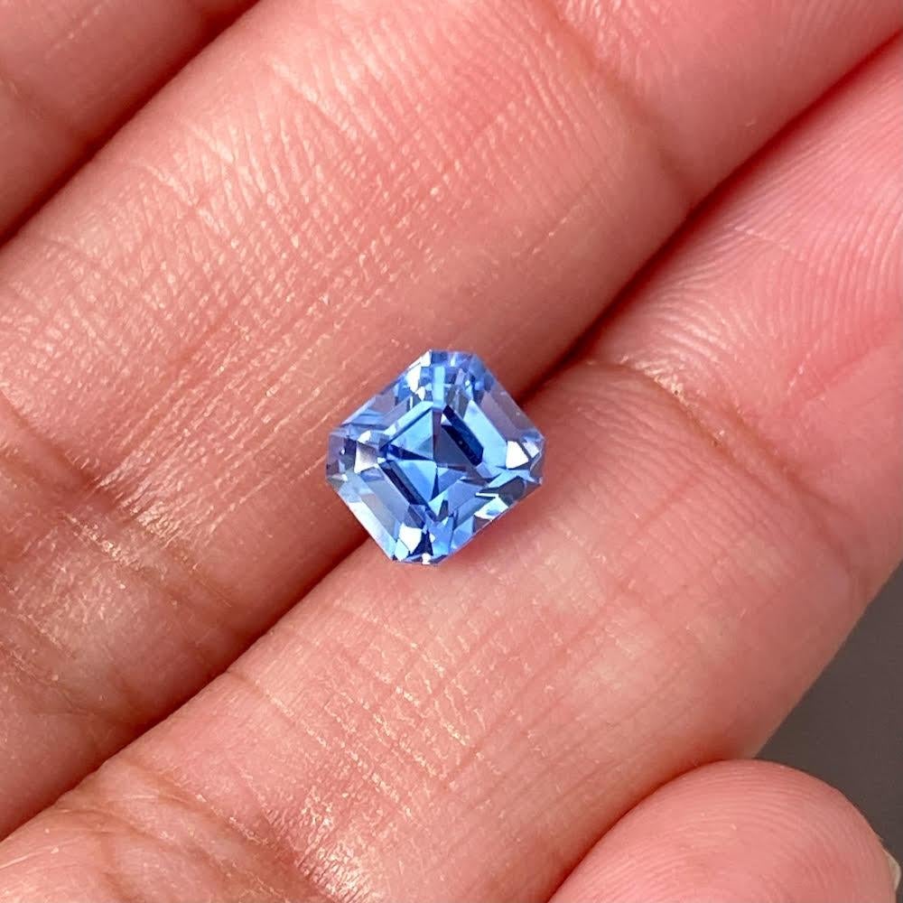 Coveted Ceylon sapphire with a pedigree rich cornflower blue colour. A certified unheated sapphire, masterfully emerald cut to 1.50 ct with precise step facets to enhance the dynamism of light, colour and heritage. A natural beauty perfect for a