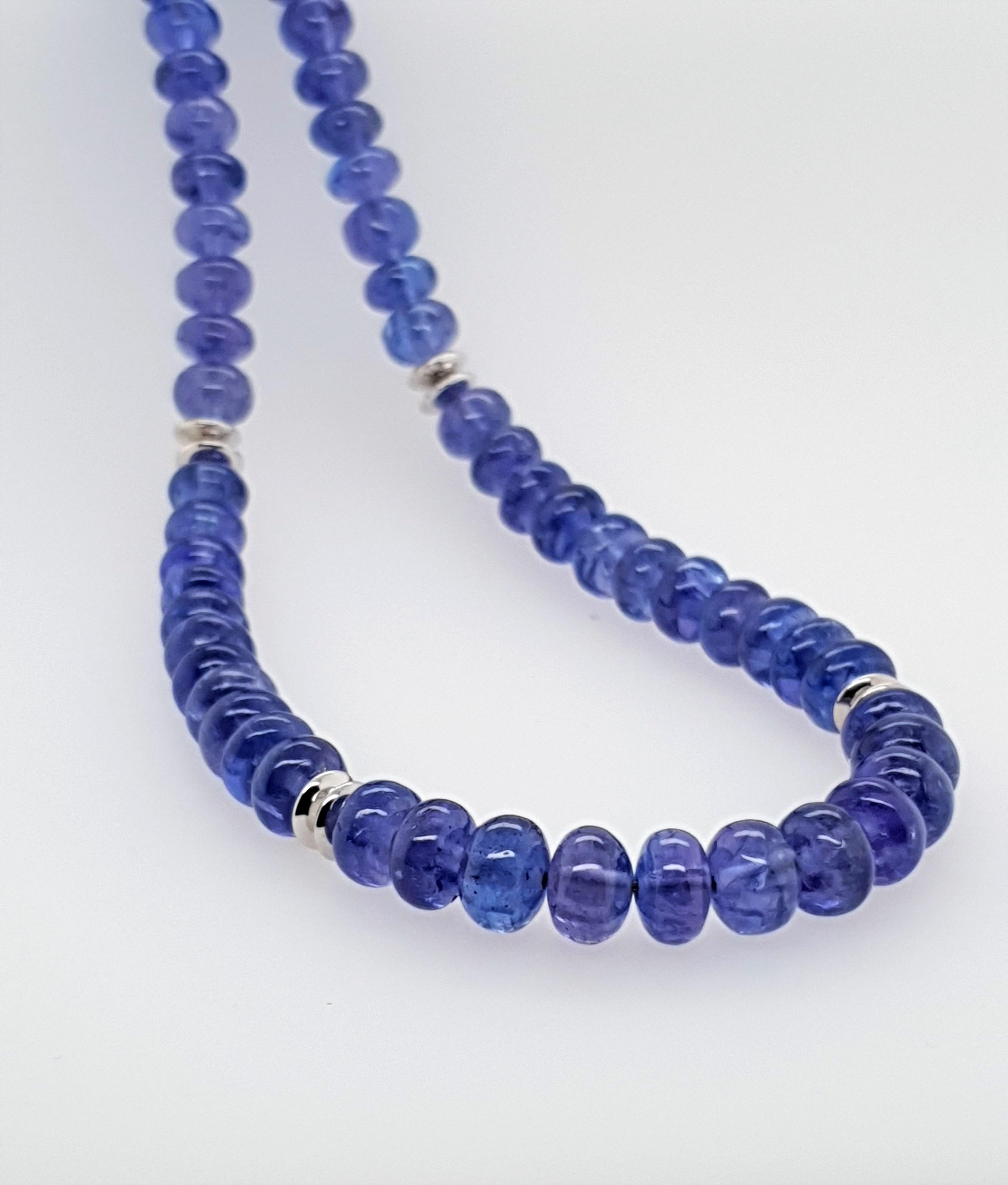 This Cornflower blue Tanzanite Rondel Beaded Necklace with 18 Carat white Gold is totally handmade. Cutting as well as goldwork are made in German quality. The screw clasp is easy to handle and very secure.
Timeless and classic design combined with