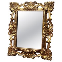 Gilt frame with finely carved floral motifs, italy