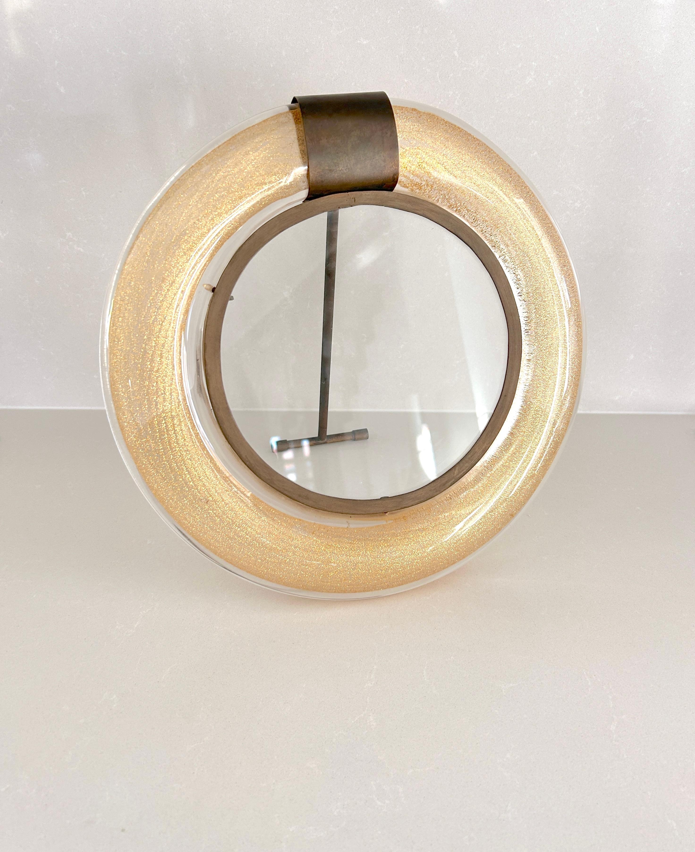 Beautiful and precious Murano glass frame, Seguso, 1950s
Glass frame with gold leaf inserts.
Brass frame and details
