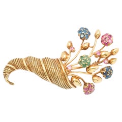 Cornucopia Brooch 1940s period Italy rubies sapphires emeralds tremblant