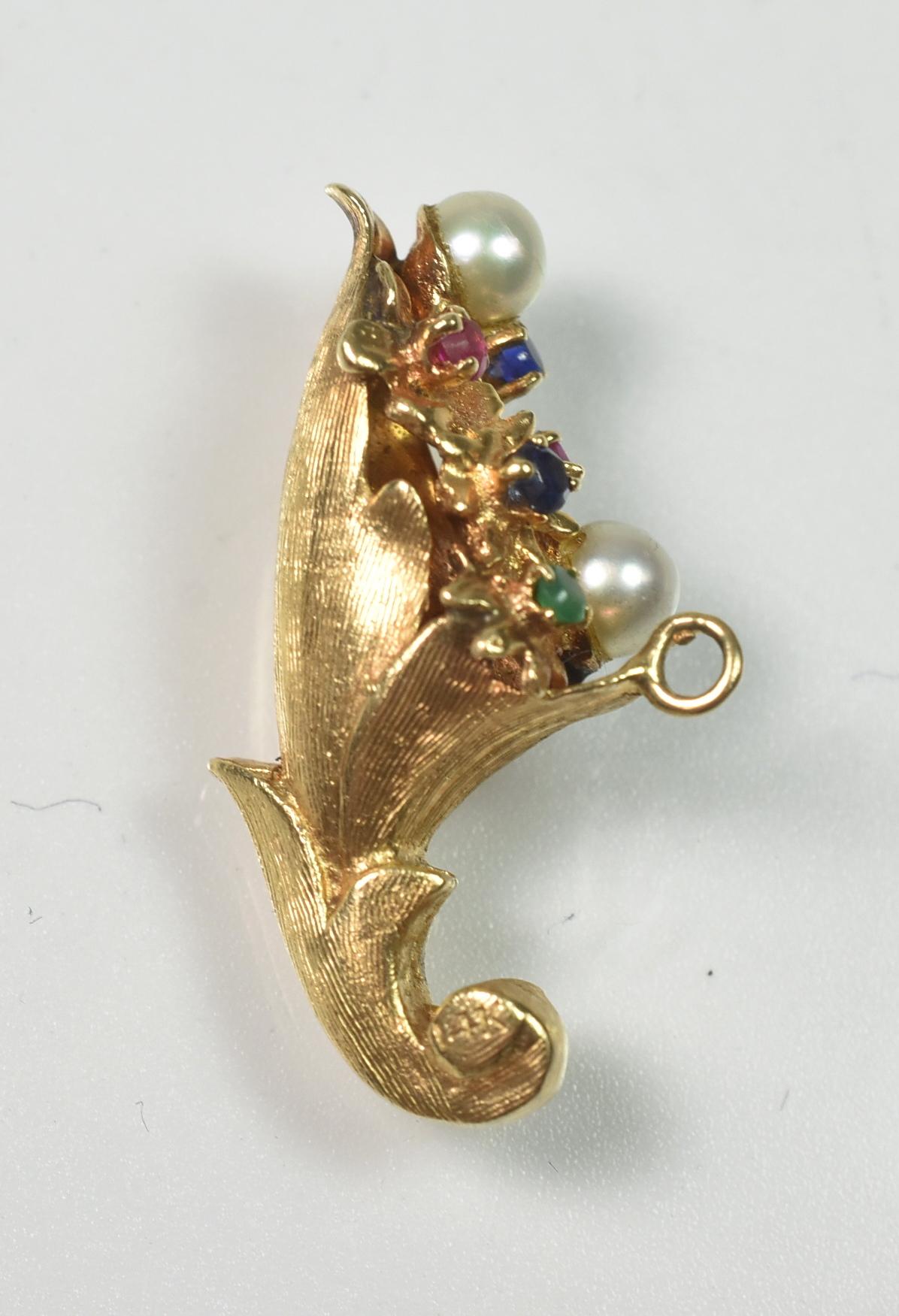 Fine jewelry cornucopia pendant with pearls. ruby, sapphires, and emerald, stamped 14K. Very good to excellent condition. Dimensions: 1 1/8