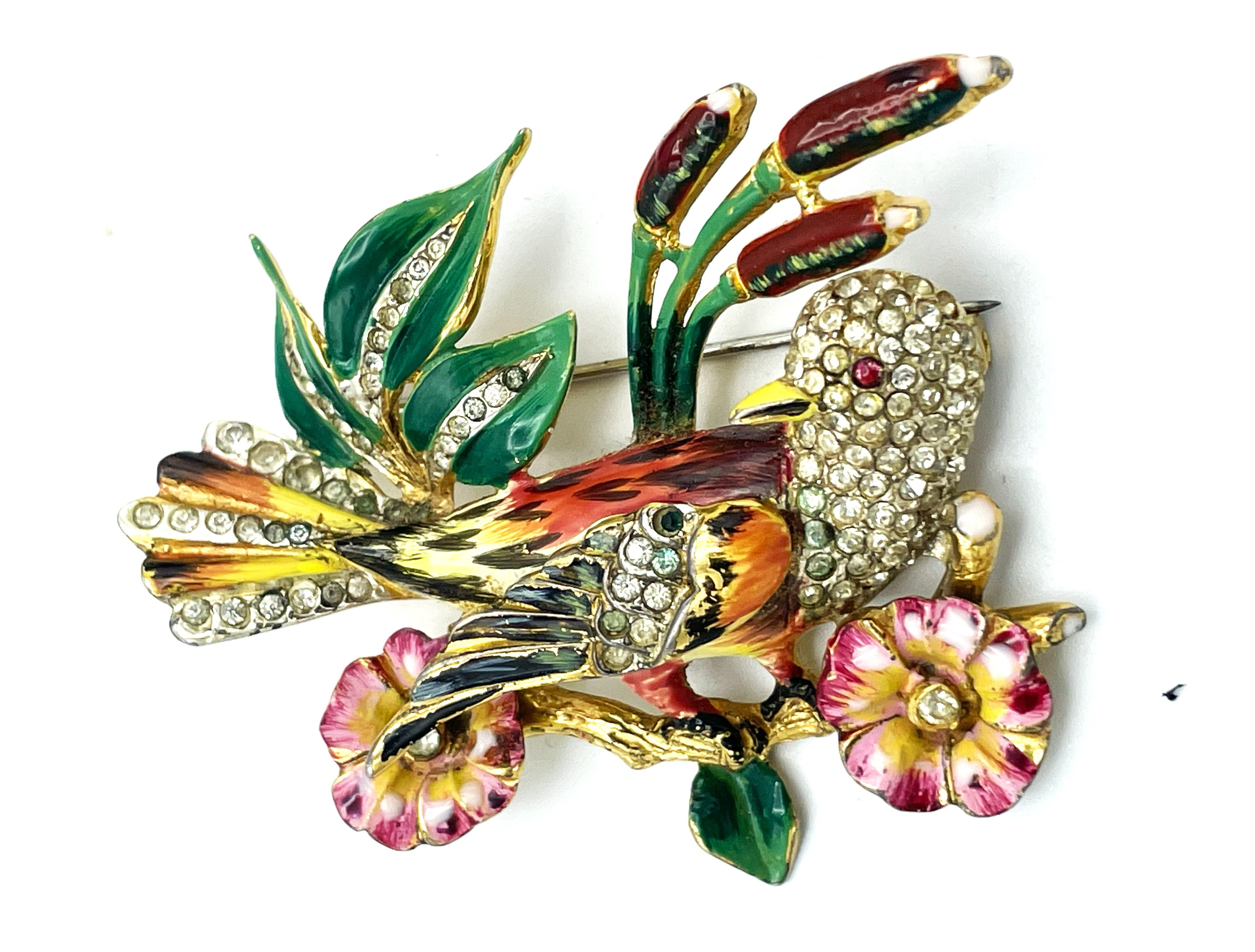 2 Coro Craft brooches, Birds on branch, gold plated Sterling ,  enamailing, rhinestones, 1942 USA

1 large bird on branch with Bullrusher and flowers and one smaller bird on branch, also gold plated sterling, enamailing and rhinestons, also Coro