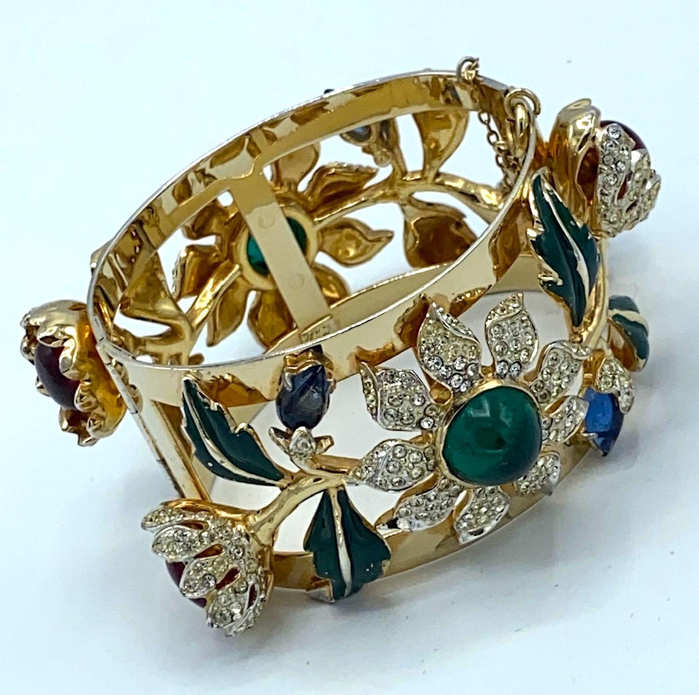 Presented here is the truly stunning and extremely desirable Camellia cuff racelet by American fashion jewelry company Coro. It has become known as the Carmen Miranda bracelet as she wears two of them in the 1948 film 