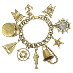 CORO - Bracelet à breloques en or sur le thème de la marine