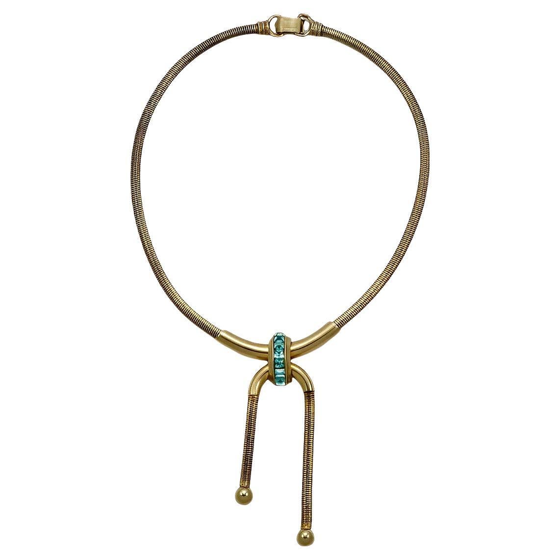 Coro Pegasus Gold Plated and Aqua Blue Rhinestone Pendant Necklace circa 1940s For Sale