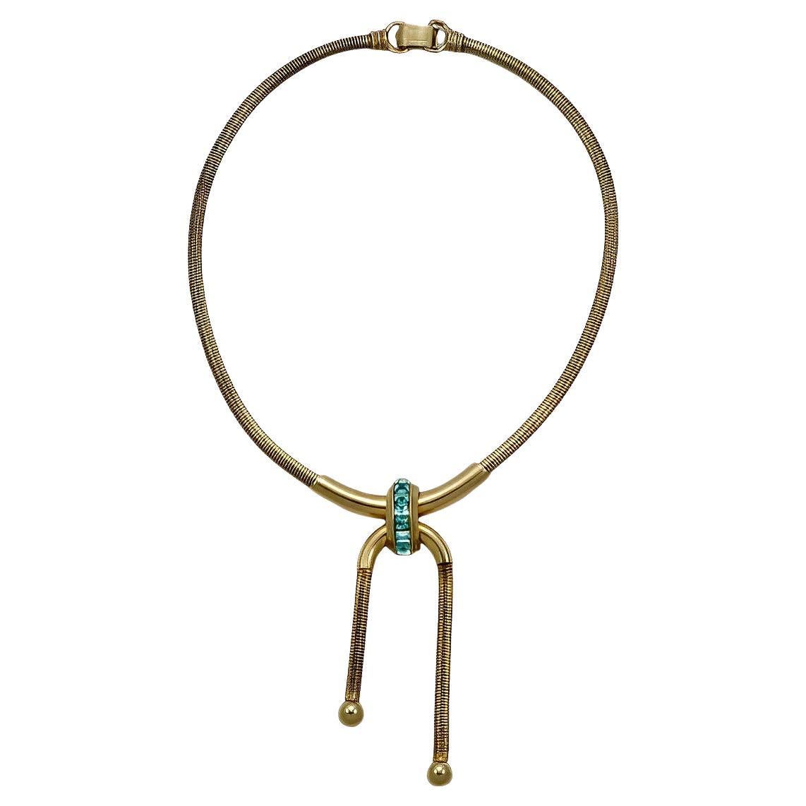 Collana con ciondolo Coro Pegasus placcato oro e strass blu acqua, anni '40 circa in vendita