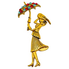 CORO signed vintage gold tone rhinestones girl with umbrella designer brooch