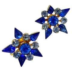 Coro orecchini vintage in vetro dorato con pietre blu, stelle e fiori con chiusura a vite