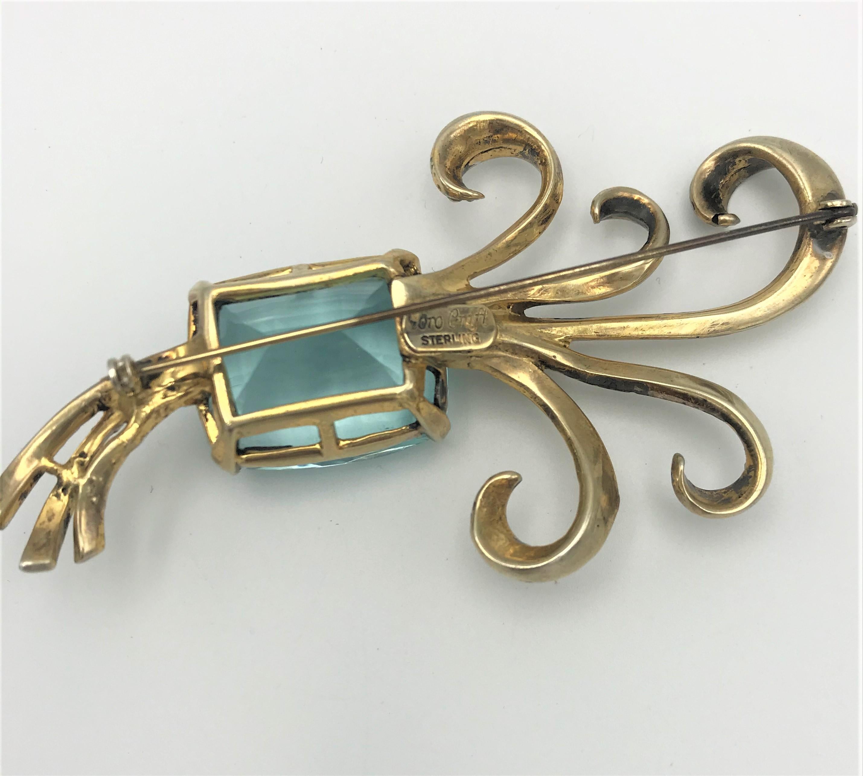 Corocraft Sterling deco gold plated brooch with faux table cut aquamarin 1943's In Excellent Condition For Sale In Stuttgart, DE
