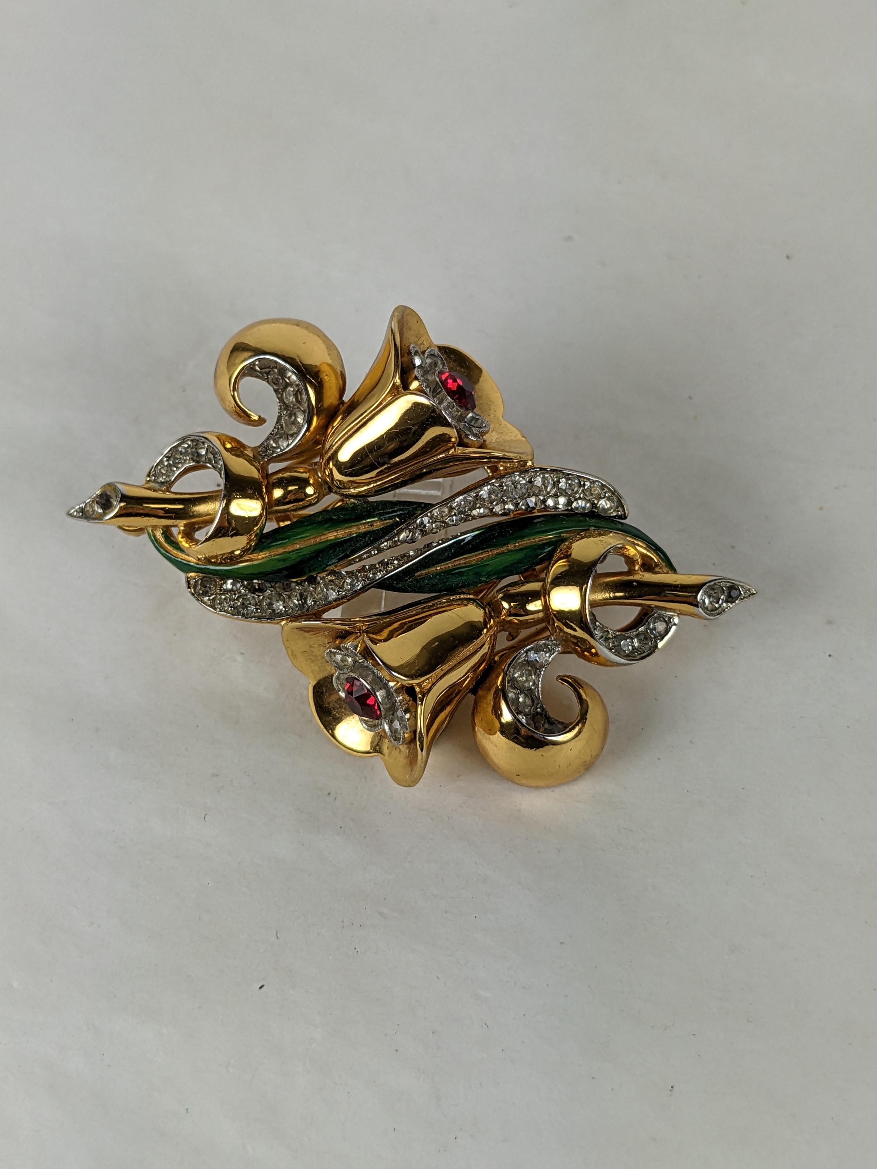 Rare Corocraft Sterling Vermeil Bellflower Duette Brooch from the 1940's. Wonderful design with conjoined flower clips which remove from their base to be worn separately. Highlighted with enamel and paste stones. 2.8