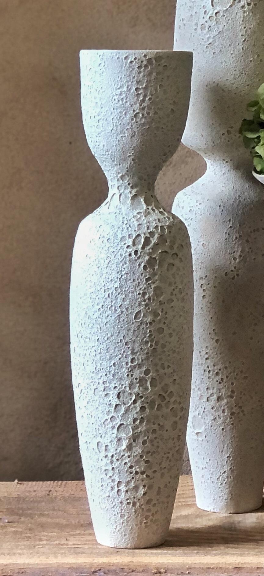Corolla Crater Vase by Sophie Vaidie
One Of A Kind.
Dimensions: D 15,5 x W 21,5 x H 35 cm. 
Materials: Beige stoneware with crater glaze.

In the beginning, there was a need to make, with the hands, the touch, the senses. Then came the desire to