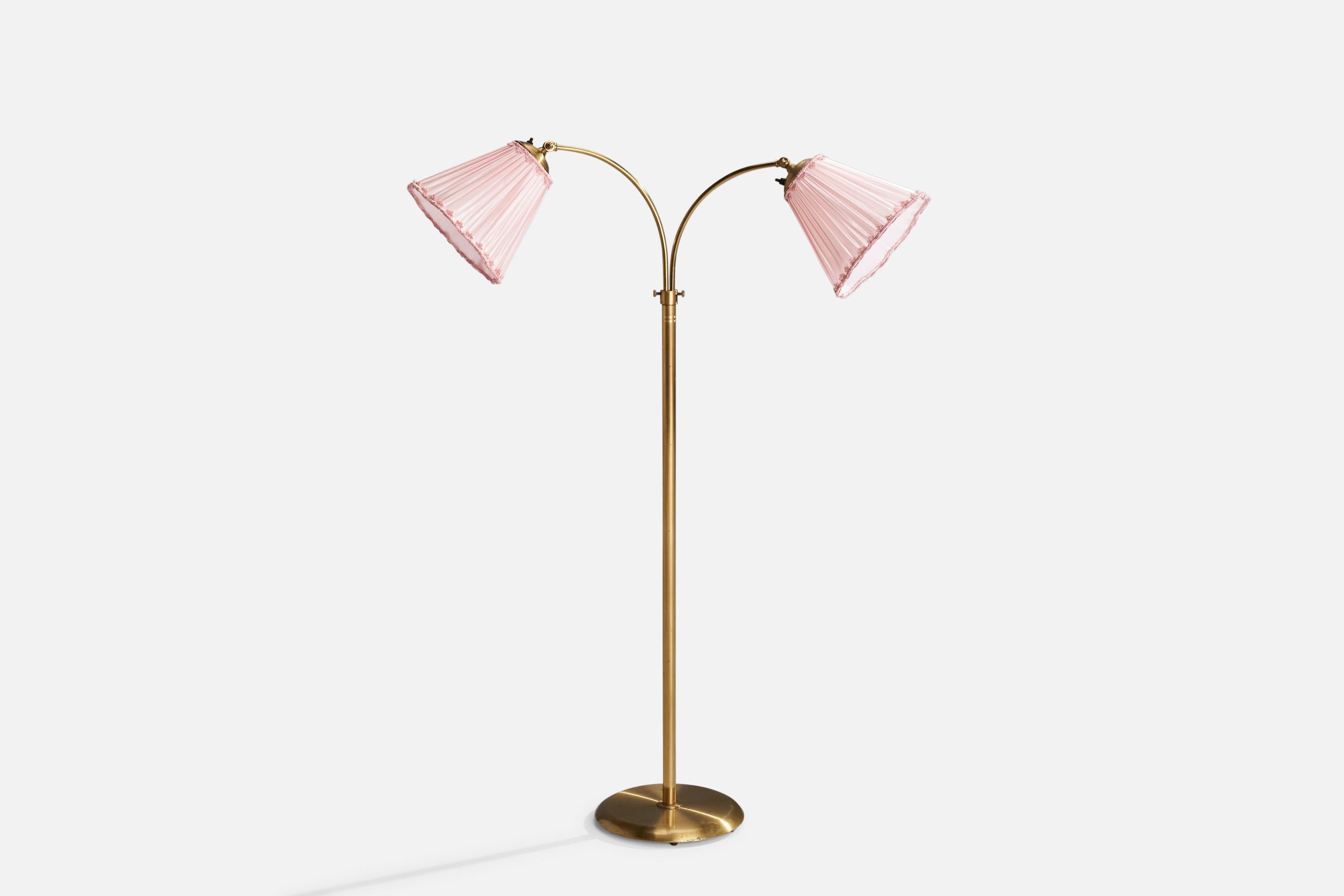 An adjustable brass and pink fabric floor lamp designed and produced by Corona Belysning, Sweden, c. 1940s.

Dimensions variable 
Overall Dimensions (inches): 49” H x13.5” W x 33” D
Stated dimensions include shade.
Bulb Specifications: E-26