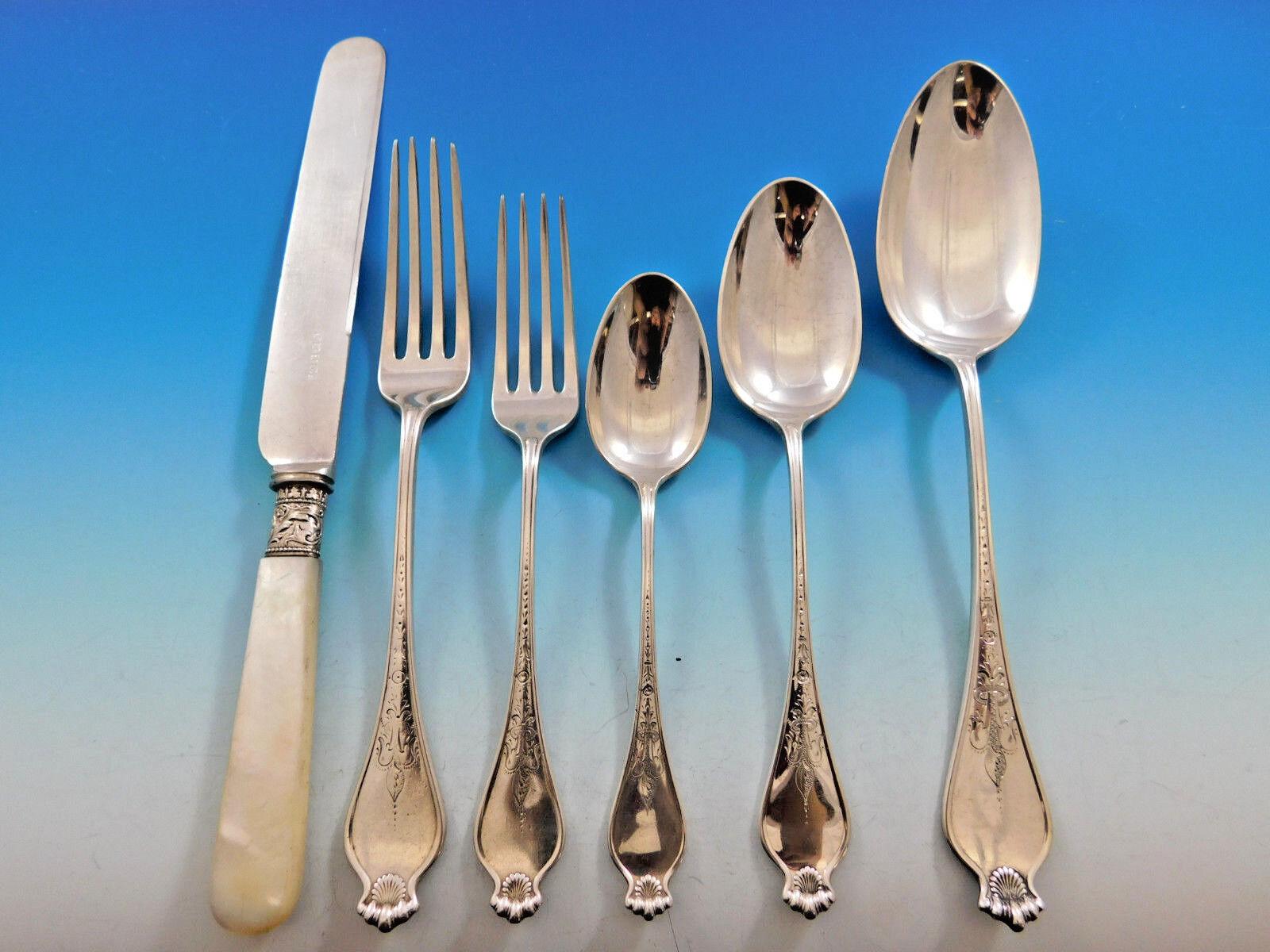Rare Corona by Dominick & Haff circa 1885 Sterling silver Flatware set with shell motif and engraved detailing, 36 pieces (including 6 Mother of Pearl handle knives). This scarce early set includes:

6 Dinner Size Knives, 9 3/4