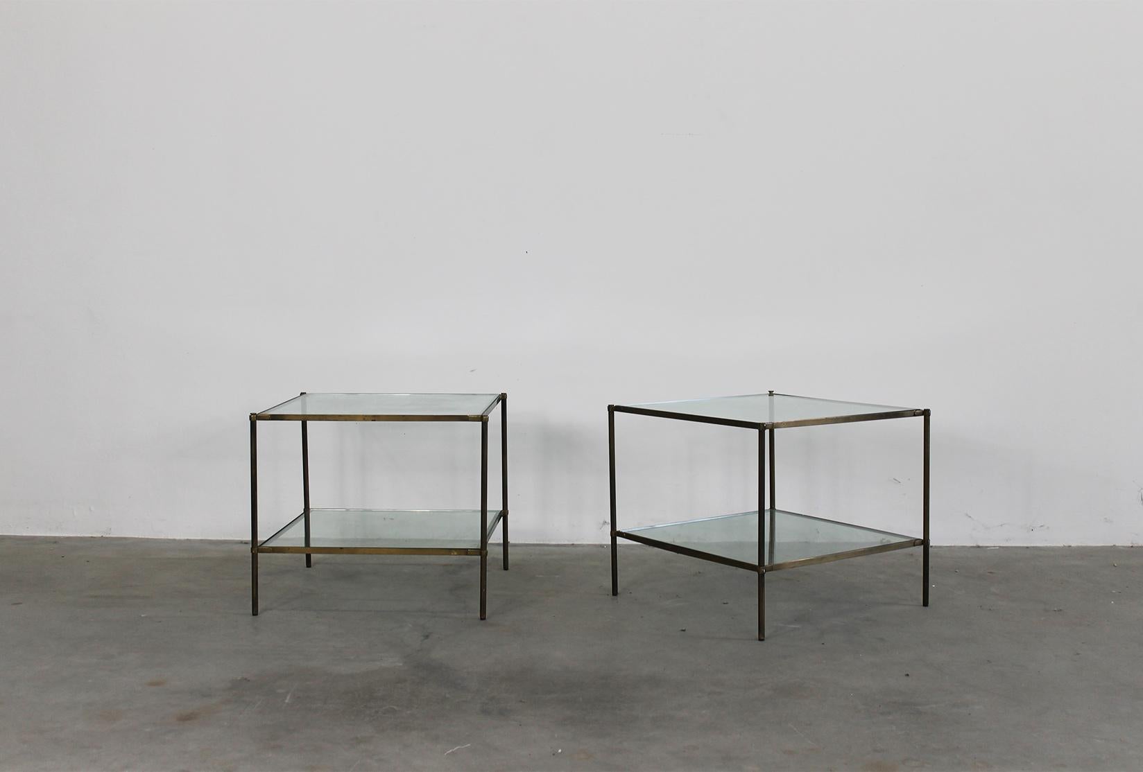 A set of two Montecarlo (T12) side tables with a simple and elegant brass structure and tabletops in crystal, they are the perfect companion for any seats, beds, or desks.

The brass structure present a pleasant patina due to the age of the