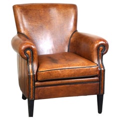 Correcto y cómodo sillón/sillón de cuero de oveja con un bonito acabado