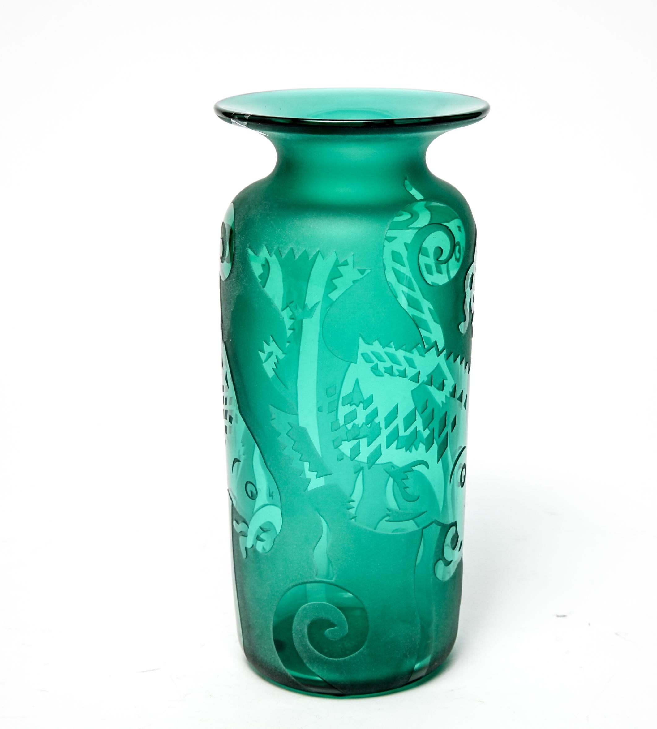 Modern etched art glass vase in green, made by Correia. The piece has a decorative fish motif and is signed on the bottom. In great vintage condition with age-appropriate wear and use.