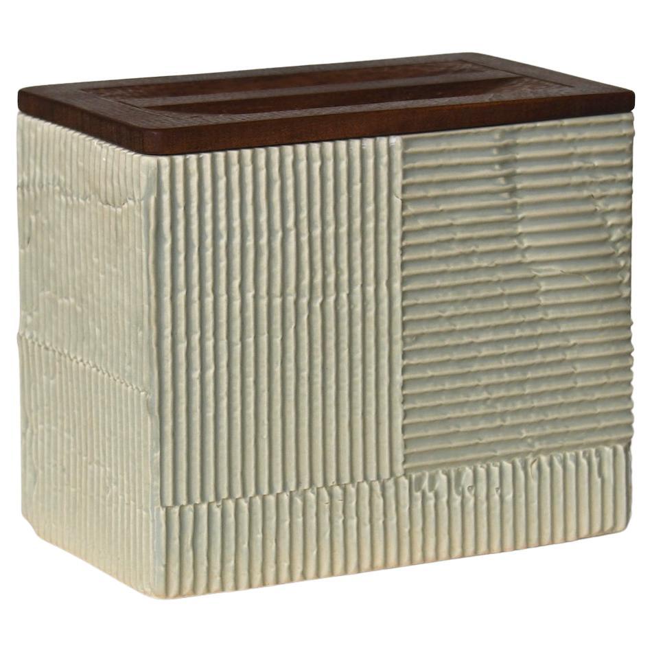 Corru Vessel no4 – Modern Handmade Glazed Ceramic and Carved Sapele Wood Lid