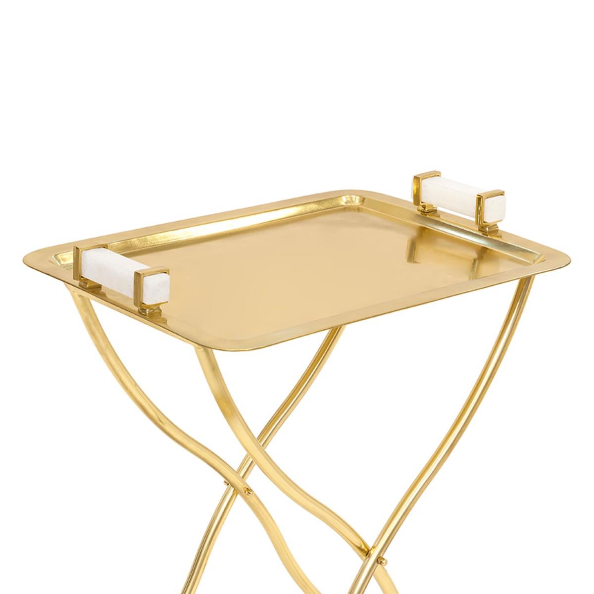 Butler tray corrugate gold in polished
gold finish with natural quartz handles.
Also available in polished chrome finish.