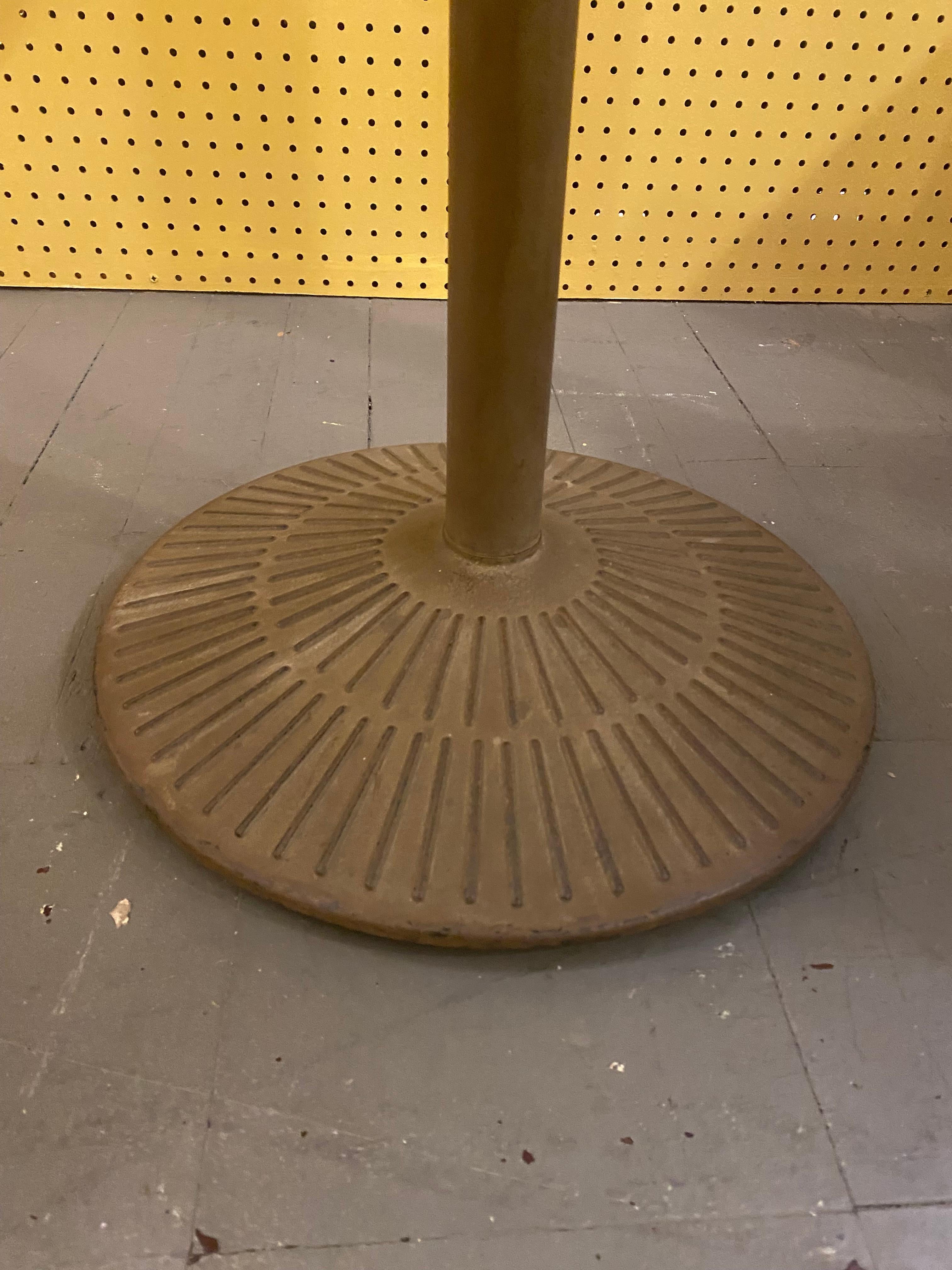 This side table features a striking combination of materials, with a cerused oak top showcasing a unique corrugated texture. The rich, textured oak contrasts beautifully with the wrought steel base, offering a modern yet timeless design. The table’s