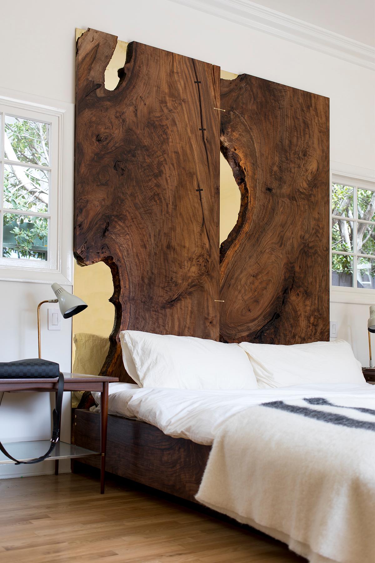 Handcrafted from two solid slabs of California Bastogne walnut with mirror polished brass inlays that reflect those within the tree, the Corset Bed features uncompromising detail and materiality. The bed frame is crafted from remnants of the two