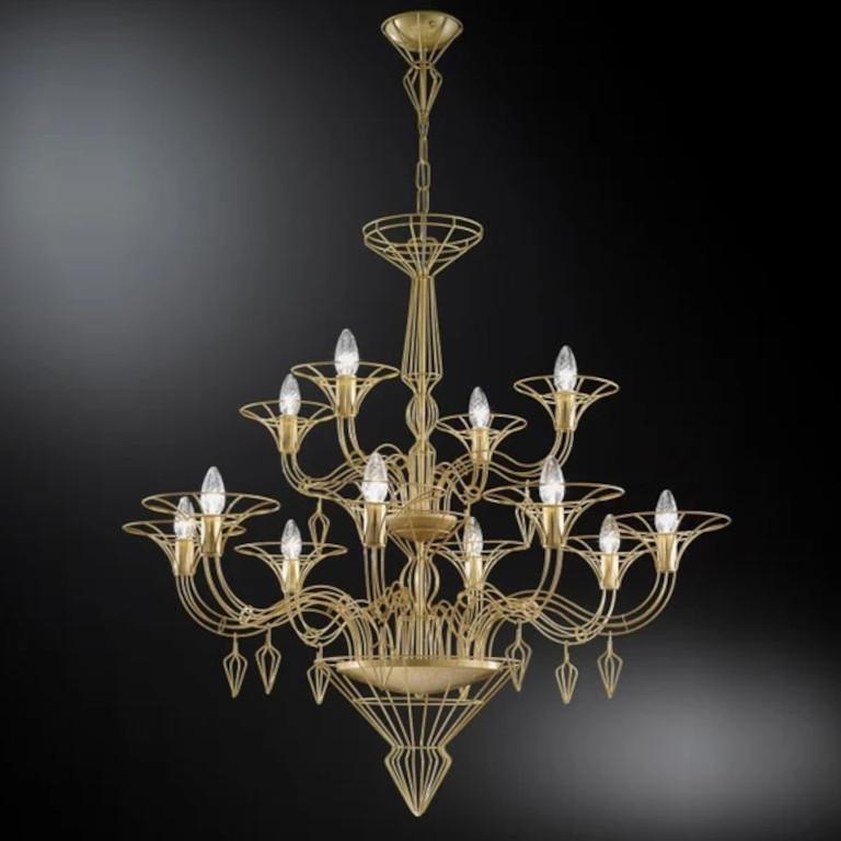 Araña italiana contemporánea con estructura metálica en acabado dorado mate que recuerda a una araña veneciana tradicional de Murano / Fabricada en Italia por Fabio Ltd
Diámetro: 39,5 pulgadas / Altura: 39,5 pulgadas más cadena y dosel
12 luces /