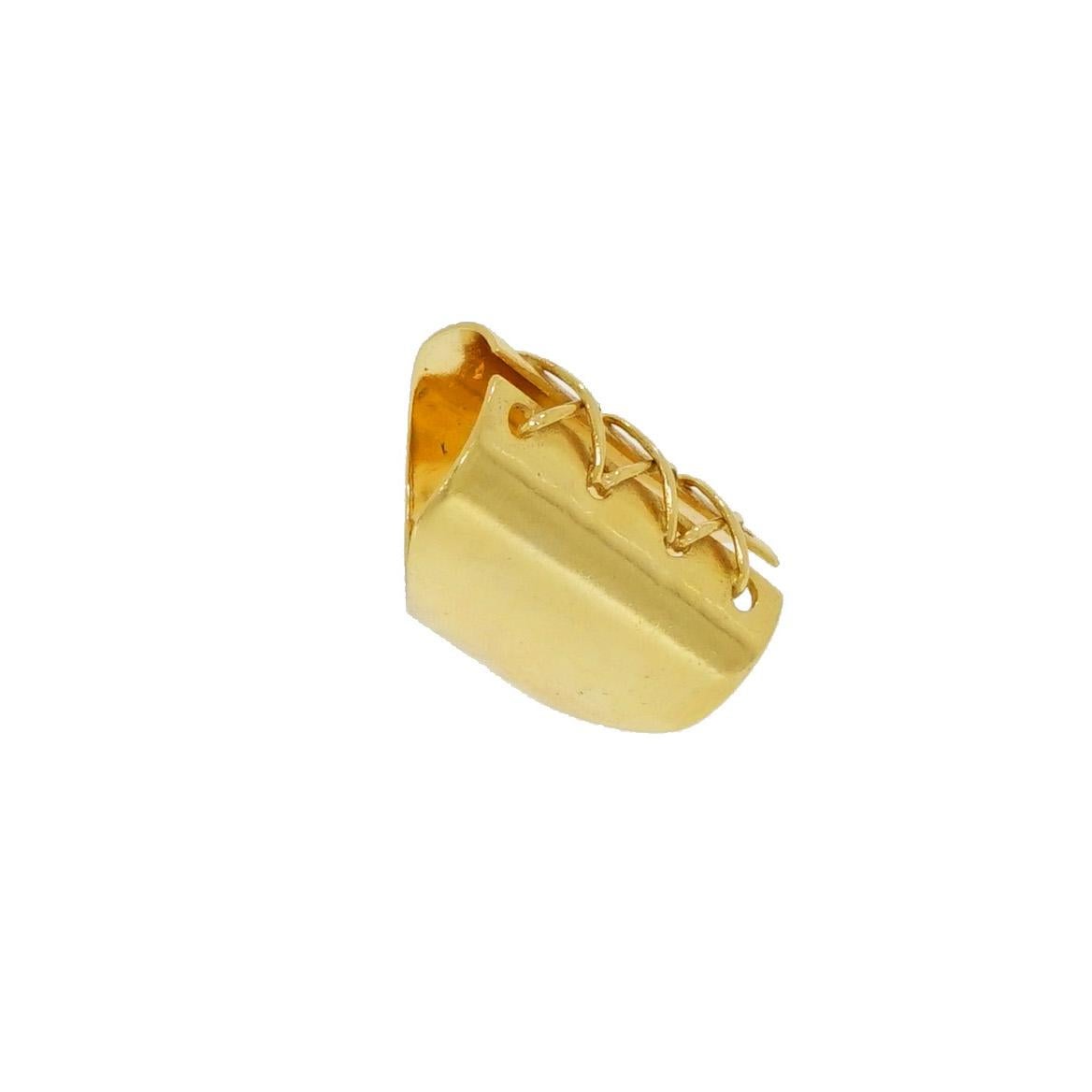 A design that speaks femininity and beauty, yet the simplicity of the details made this ring very unique. The corset design is crafted in 14k Yellow Gold and measures approximately 26.5mm wide.
Made to fit a finger size: 5
