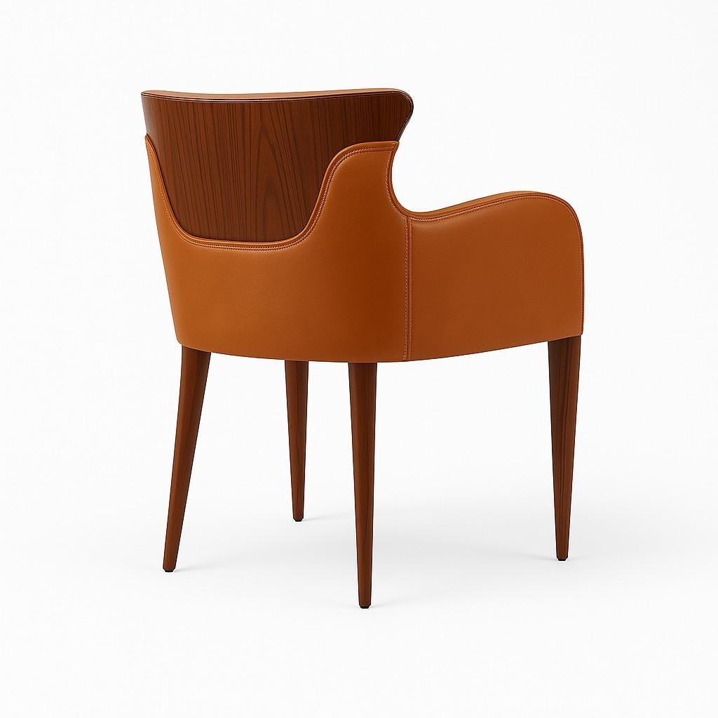 The Corset Dining Chair blends classic tailoring with contemporary sophistication. Its defining silhouette features a gracefully curved backrest reminiscent of a corset's form—tightly cinched at the center and flaring outward with poise. The inner