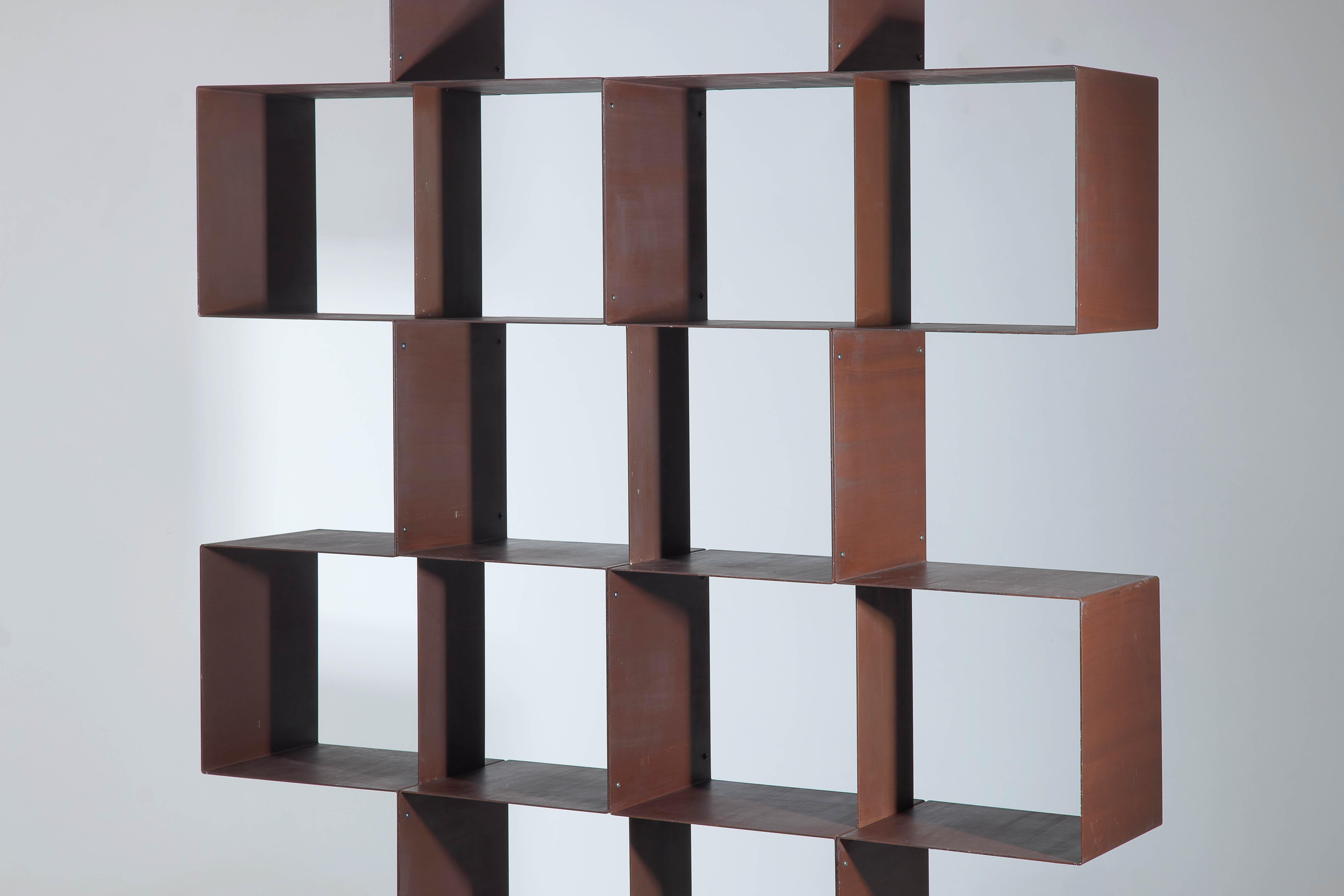 A corten steel shelving unit produced by Secco Sistemi for The Conran Shop, Circa 2000, made in Italy. The Etno unit is modular and can be split apart into two sections. The condition is very good with minor wear consistent with age.

Dimensions: