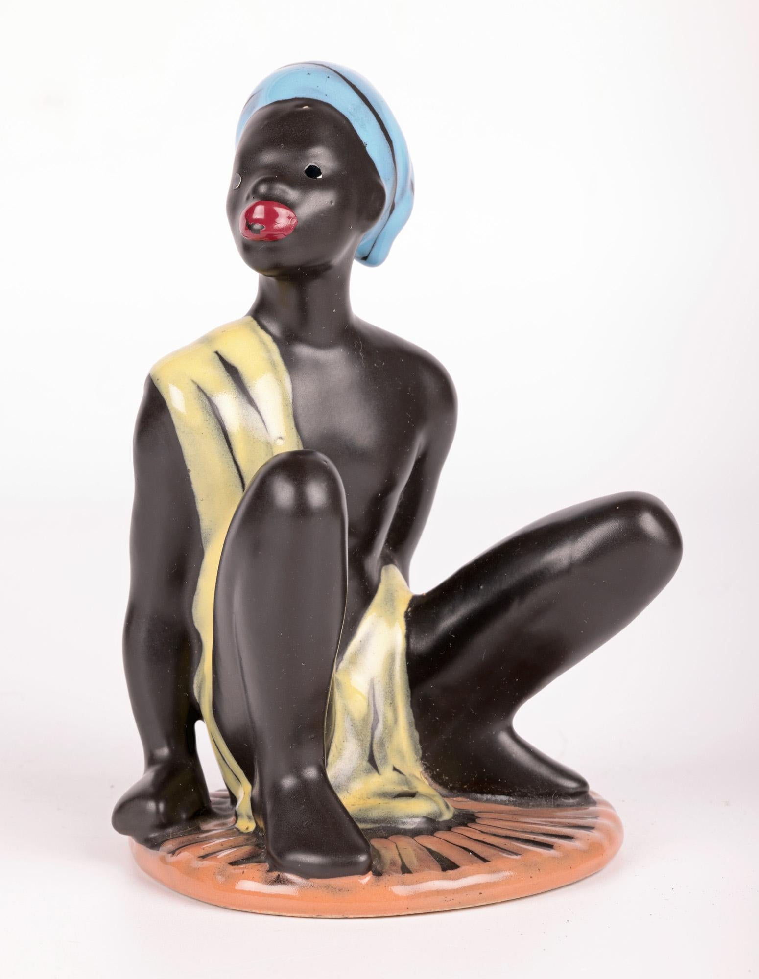 Mid-Century Modern Cortendorf West German Mid-Century Pottery Seated African Man For Sale