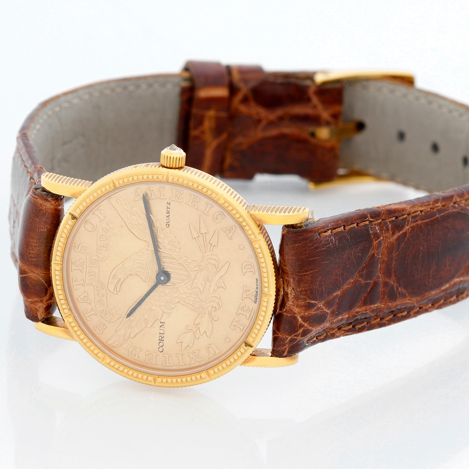 Corum $10 22K Gold Eagle 1893 Unisez Watch  - Quartz. 22K Yellow gold ( 28 mm ) . 1893  Gold eagle coin . Brown alligator strap with Corum tang buckle . Pre-owned with Custom box .