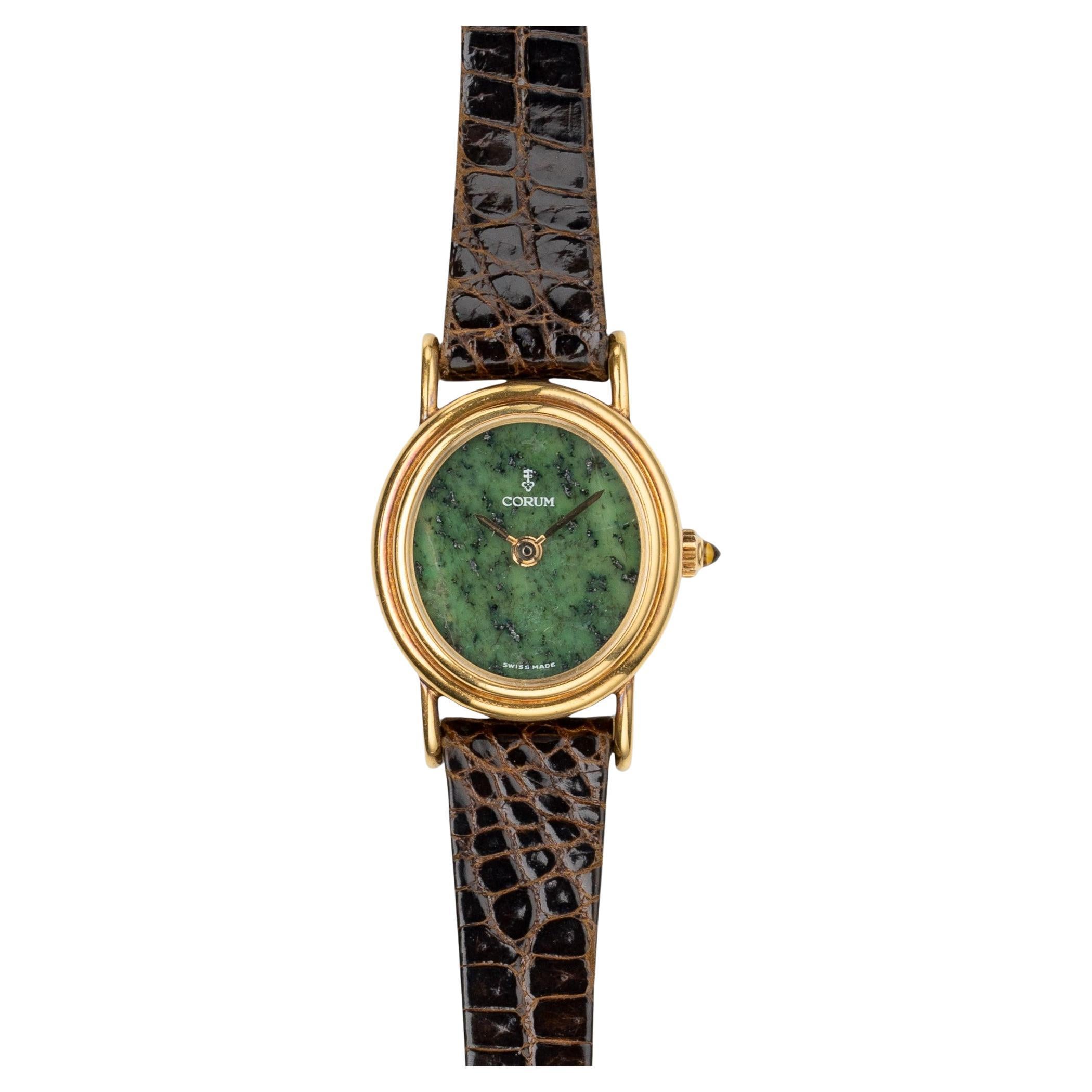 Corum 15676 Jade Dial Double Stepped 18k YG 1970s en vente