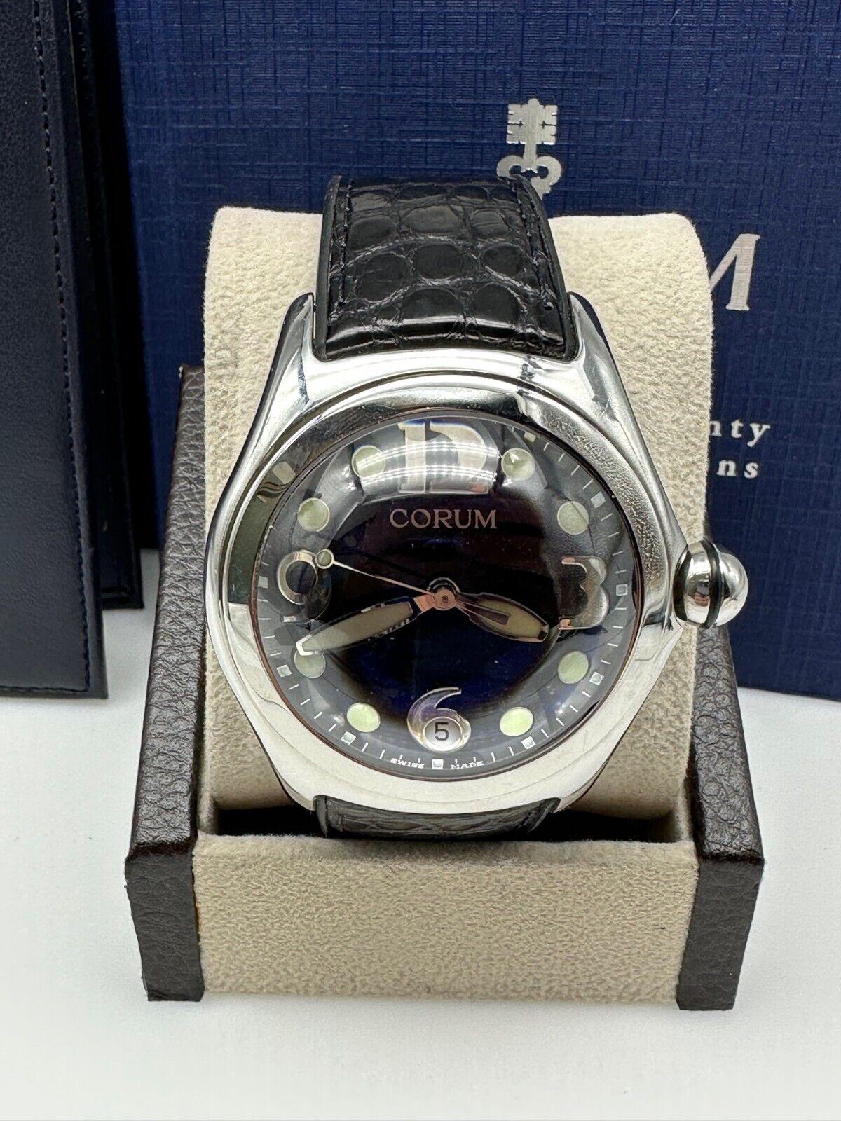 Corum 163.150.20 Bubble Stainless Steel Black Leather Box Paper, 2005 For Sale