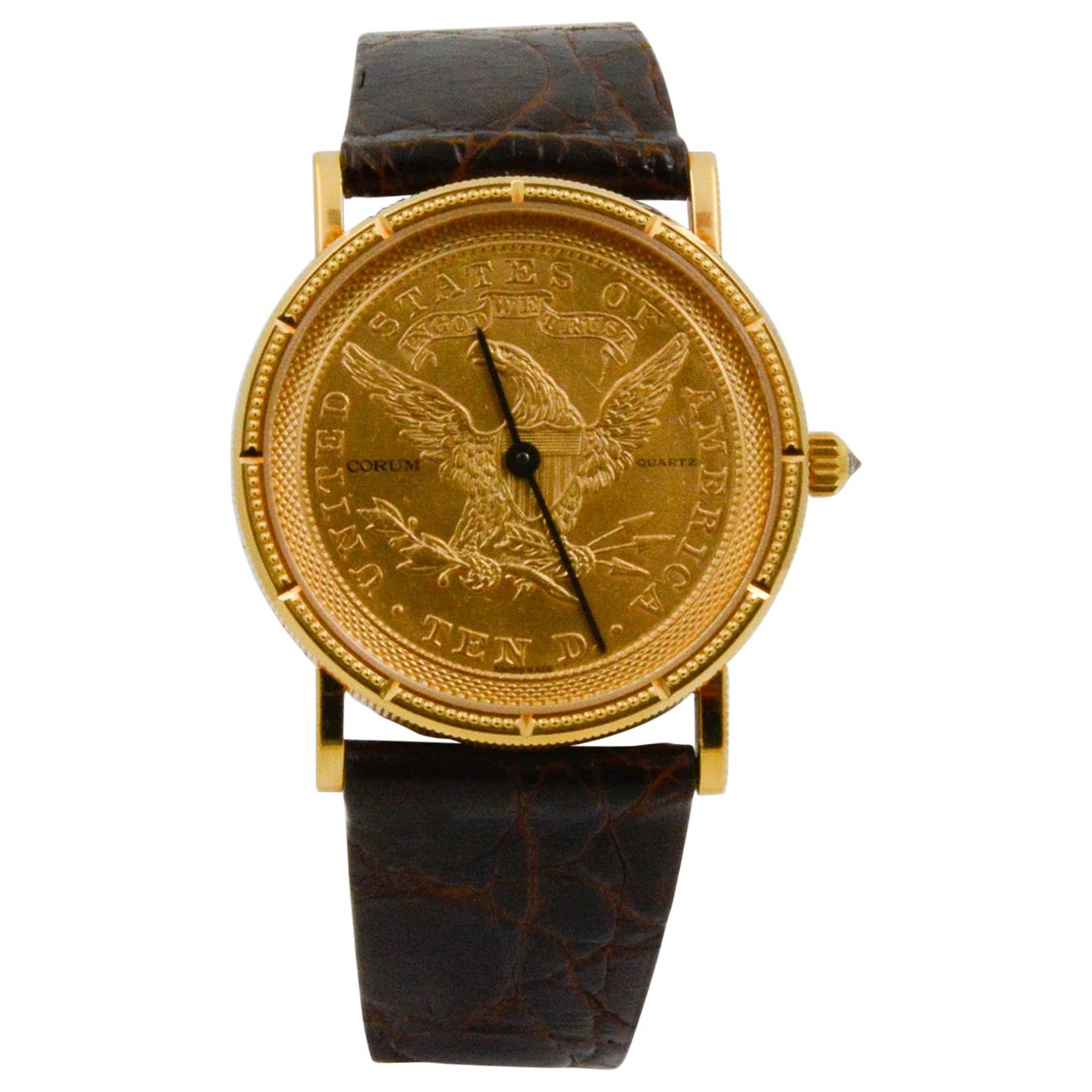 This 18k yellow gold circa 1995 CPO Corum watch features the design of the $10 American coin, dated 1865, the year the Civil War ended. The watch is 36mm with sapphire crystal and quartz movement. It is also paired with a 20mm brown crocodile strap